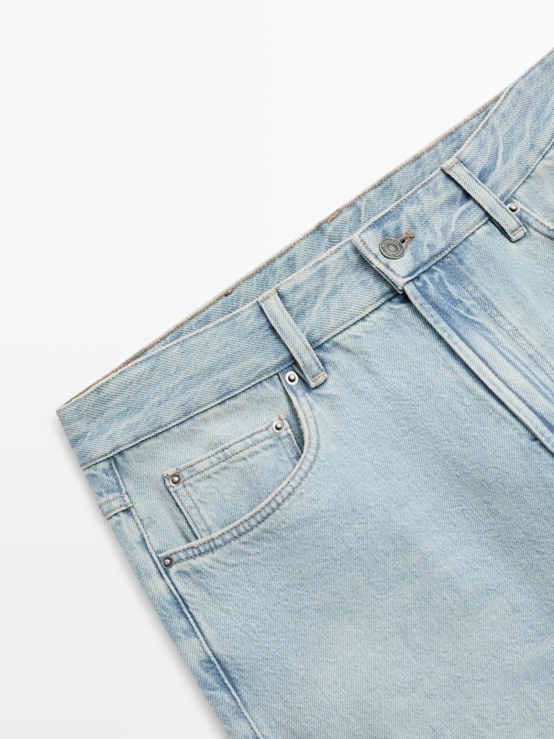 Джинсы с широкими штанинами