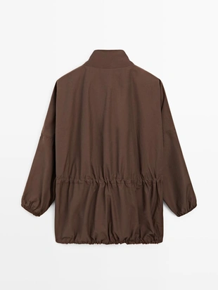 Пуховик с воротником деталями- Заказать в России