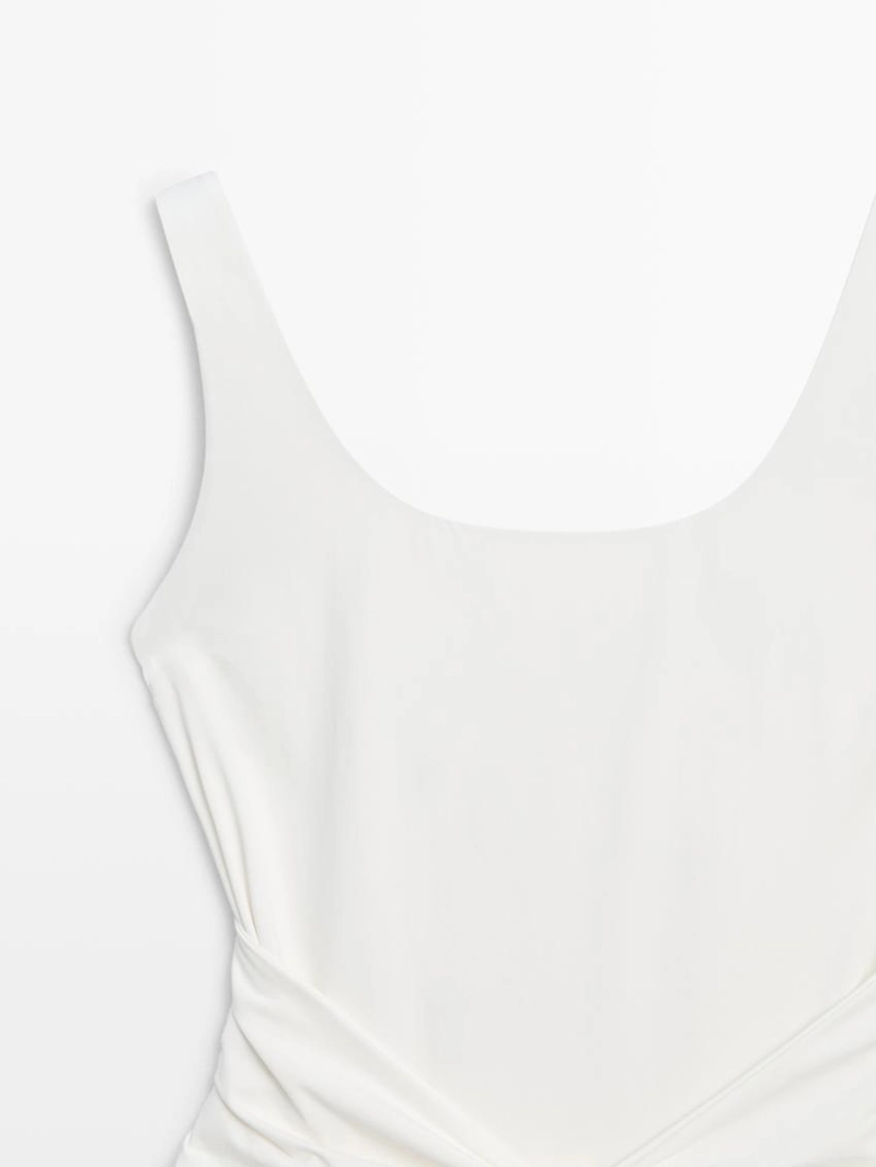 Купальник с деталями из драгоценных камней