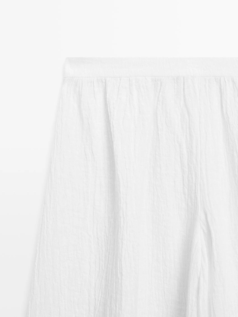 Льняные брюки саруэль