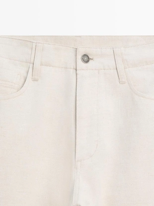 Джинсы из хлопка и льна с зауженным кроем- Заказать в России