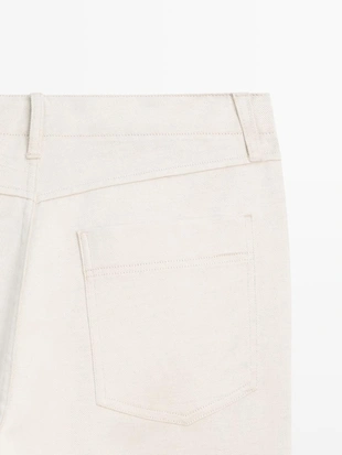 Джинсы из хлопка и льна с зауженным кроем- Заказать в России