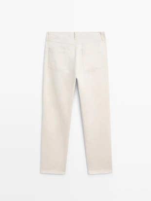 Джинсы из хлопка и льна с зауженным кроем- Заказать в России