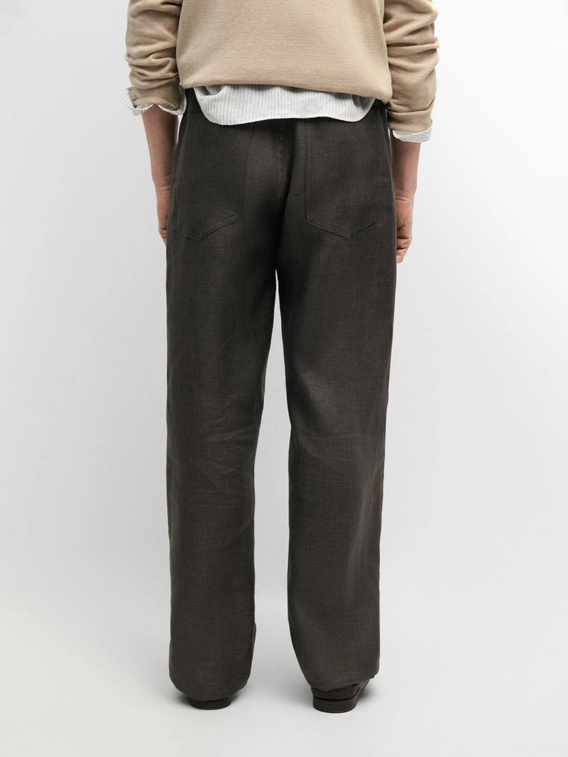 Льняные джинсовые брюки полуприталенного кроя