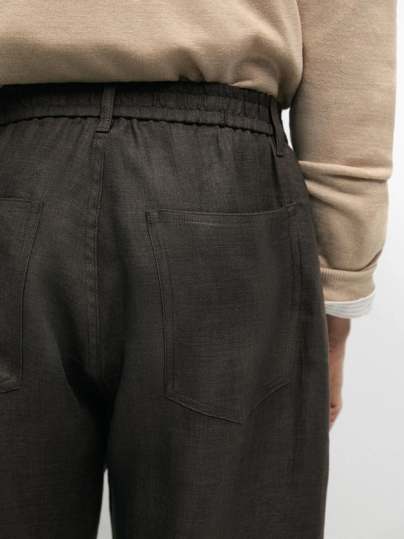 Льняные джинсовые брюки полуприталенного кроя