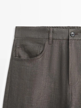 Льняные джинсовые брюки полуприталенного кроя- Заказать в России