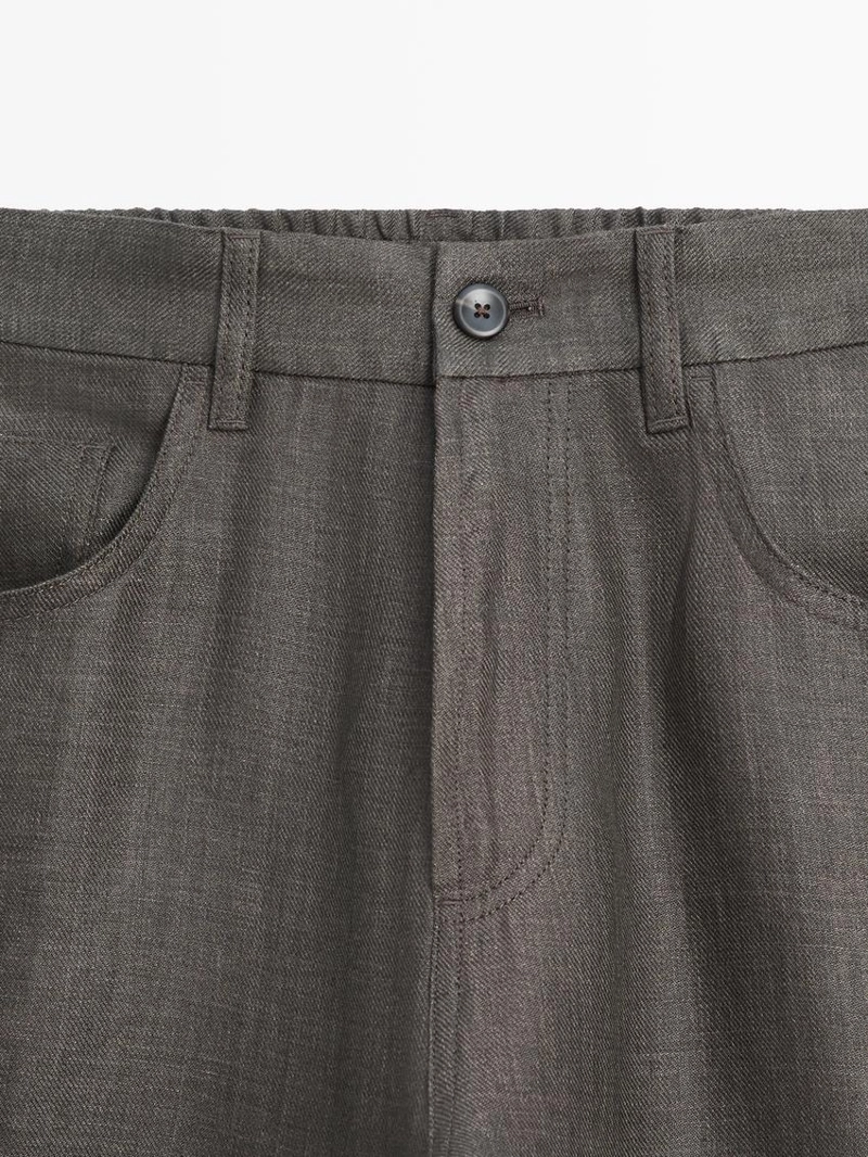 Льняные джинсовые брюки полуприталенного кроя