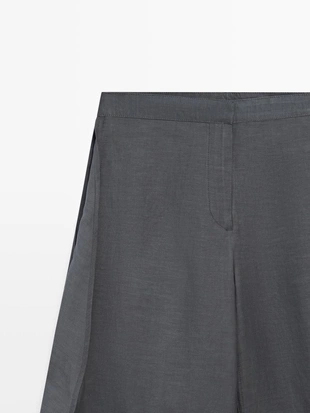 Брюки из льняной смеси с разрезами- Заказать в России