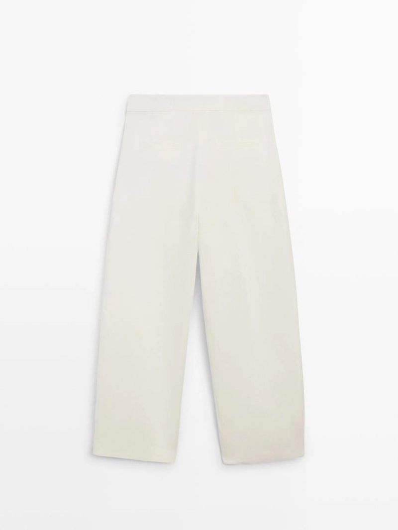 Льняные брюки силуэта бочонок