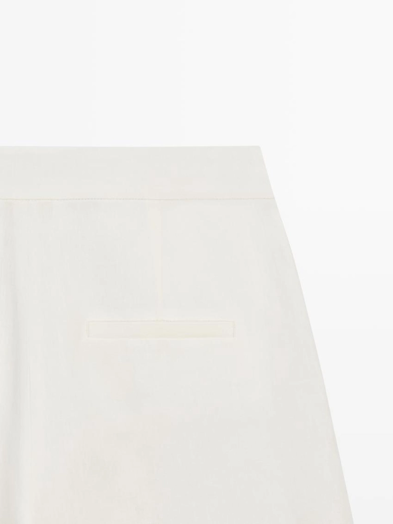 Льняные брюки силуэта бочонок