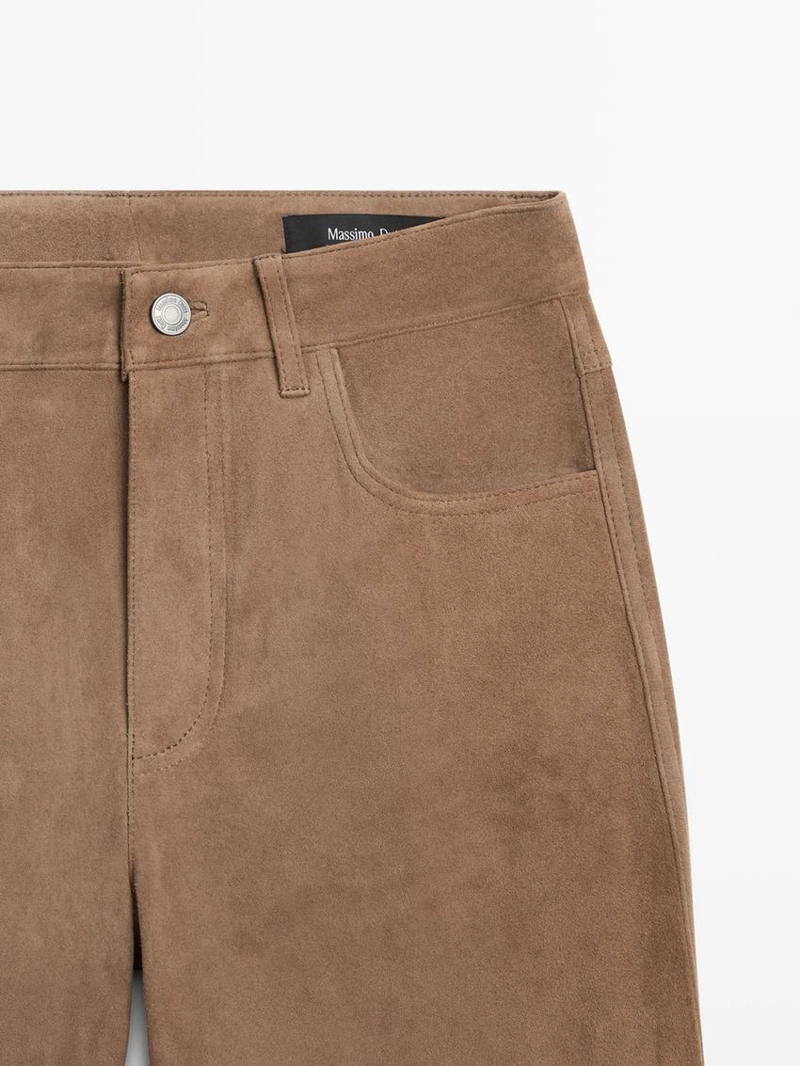 Кожаные леггинсы с запахом и расклешенными штанинами