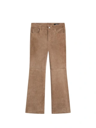 Кожаные леггинсы с запахом и расклешенными штанинами- Заказать в России