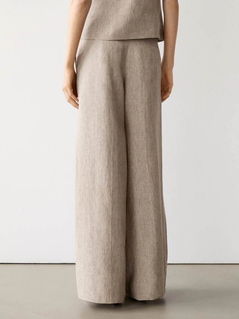 Льняные меланжевые брюки с защипами