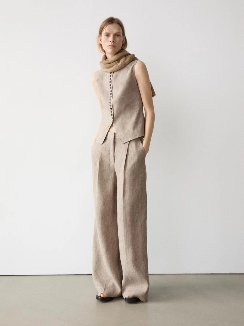 Льняные меланжевые брюки с защипами
