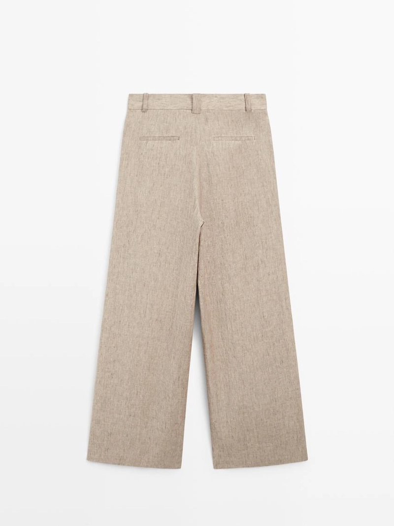 Льняные меланжевые брюки с защипами