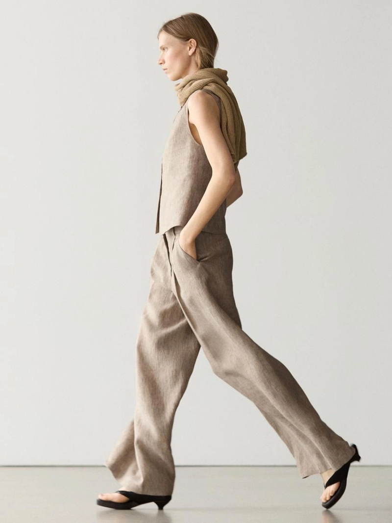 Льняные меланжевые брюки с защипами