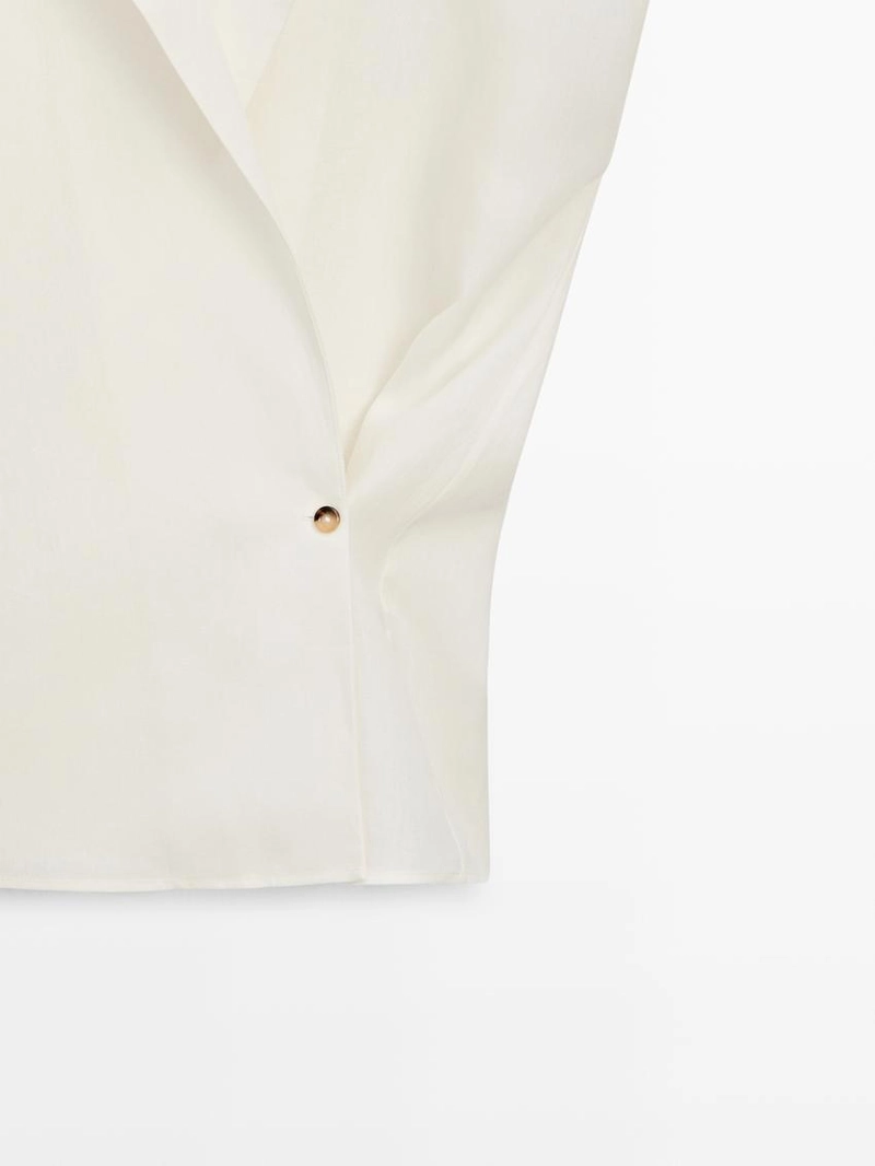 Жилет из льна на пуговицах