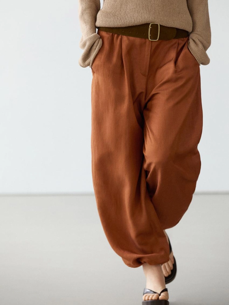 Брюки со свободным кроем и деталью на завязке