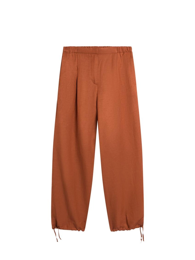 Брюки со свободным кроем и деталью на завязке