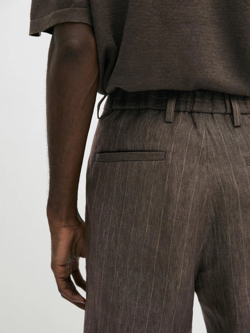 Полосатые льняные брюки