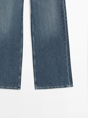 Джинсы с высокой талией и широкими брючинами- Заказать в России