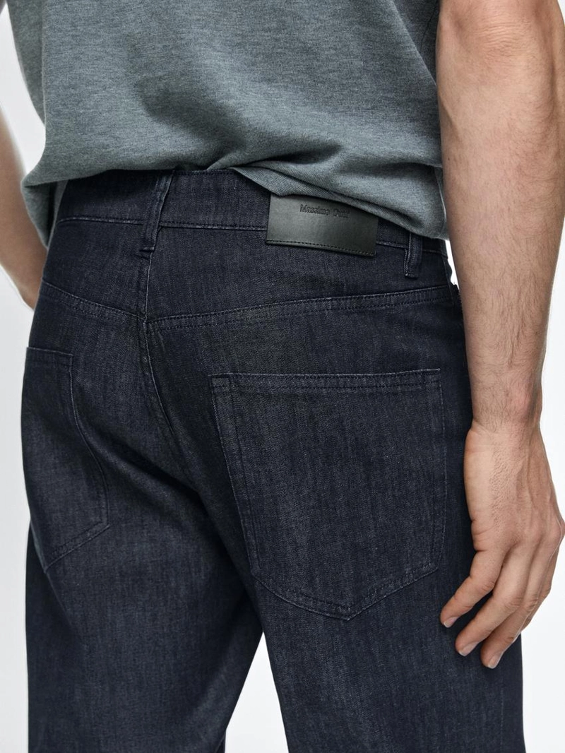 Джинсовые брюки со светлым эффектом и зауженным кроем