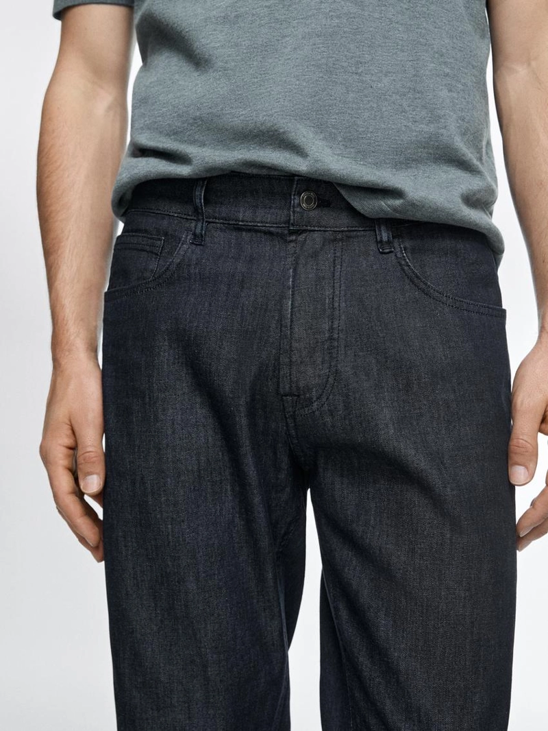 Джинсовые брюки со светлым эффектом и зауженным кроем