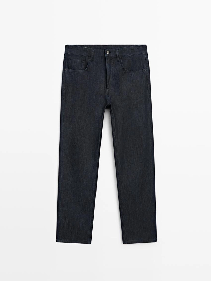 Джинсовые брюки со светлым эффектом и зауженным кроем