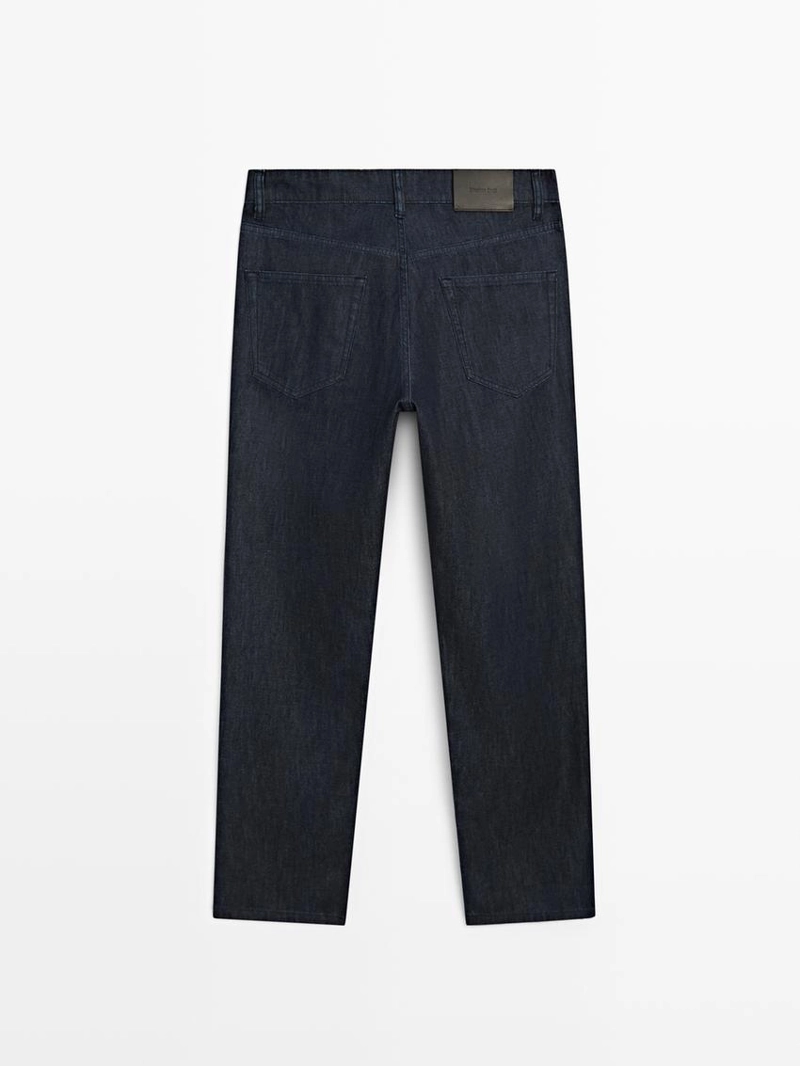 Джинсовые брюки со светлым эффектом и зауженным кроем