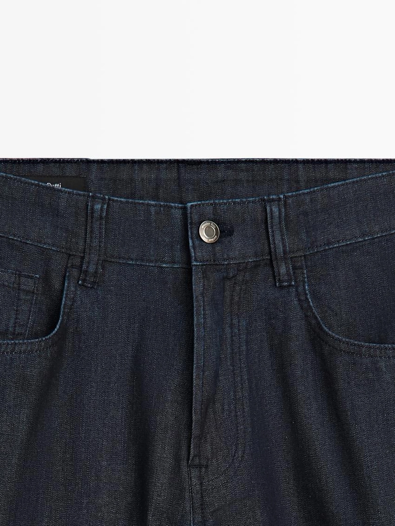 Джинсовые брюки со светлым эффектом и зауженным кроем