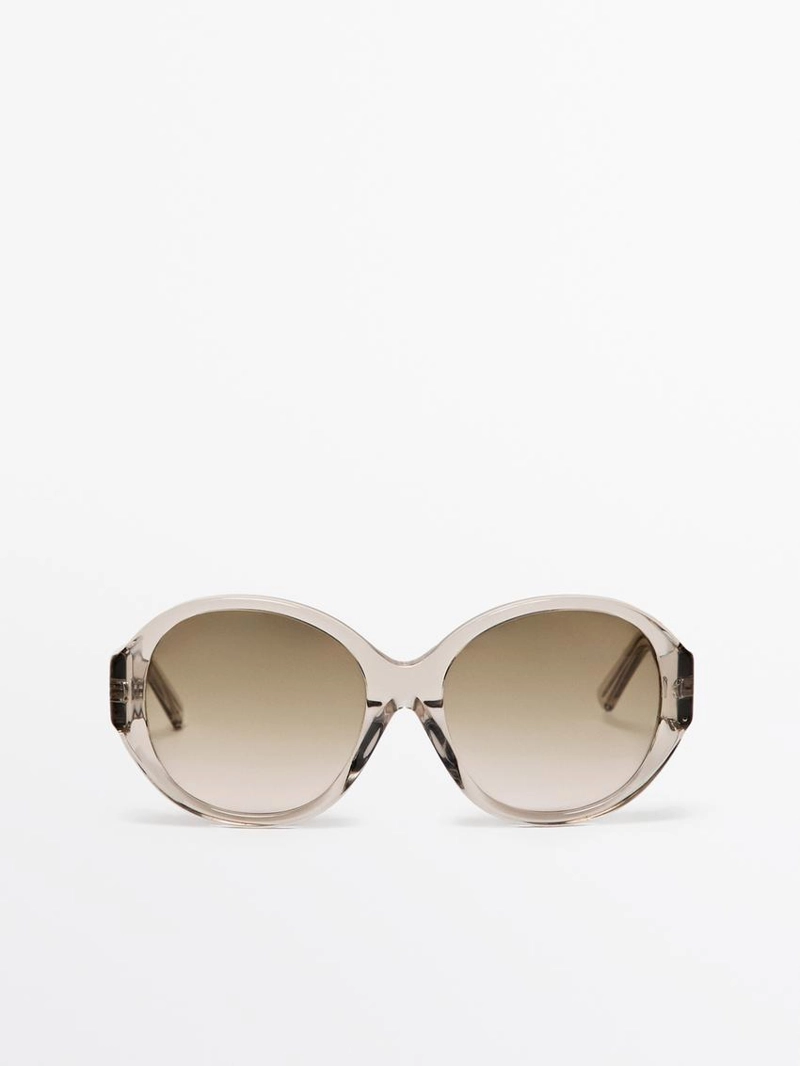 Солнцезащитные очки круглой формы