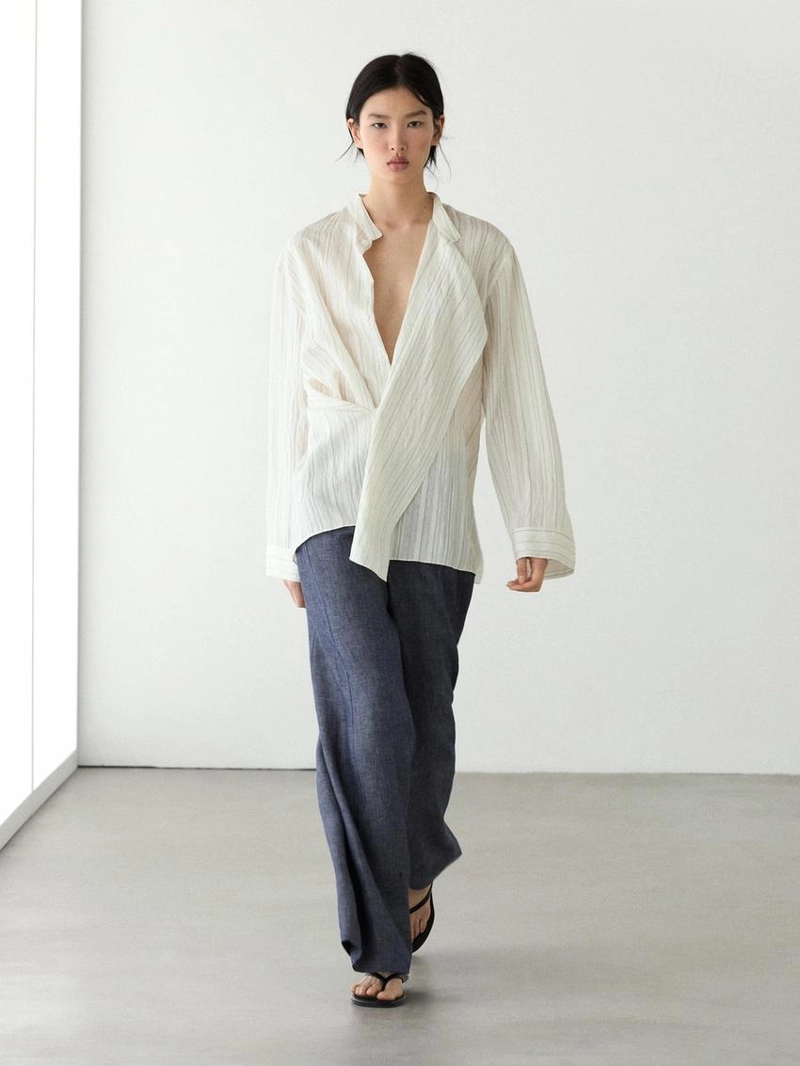 Брюки-палаццо из льна с высокой талией