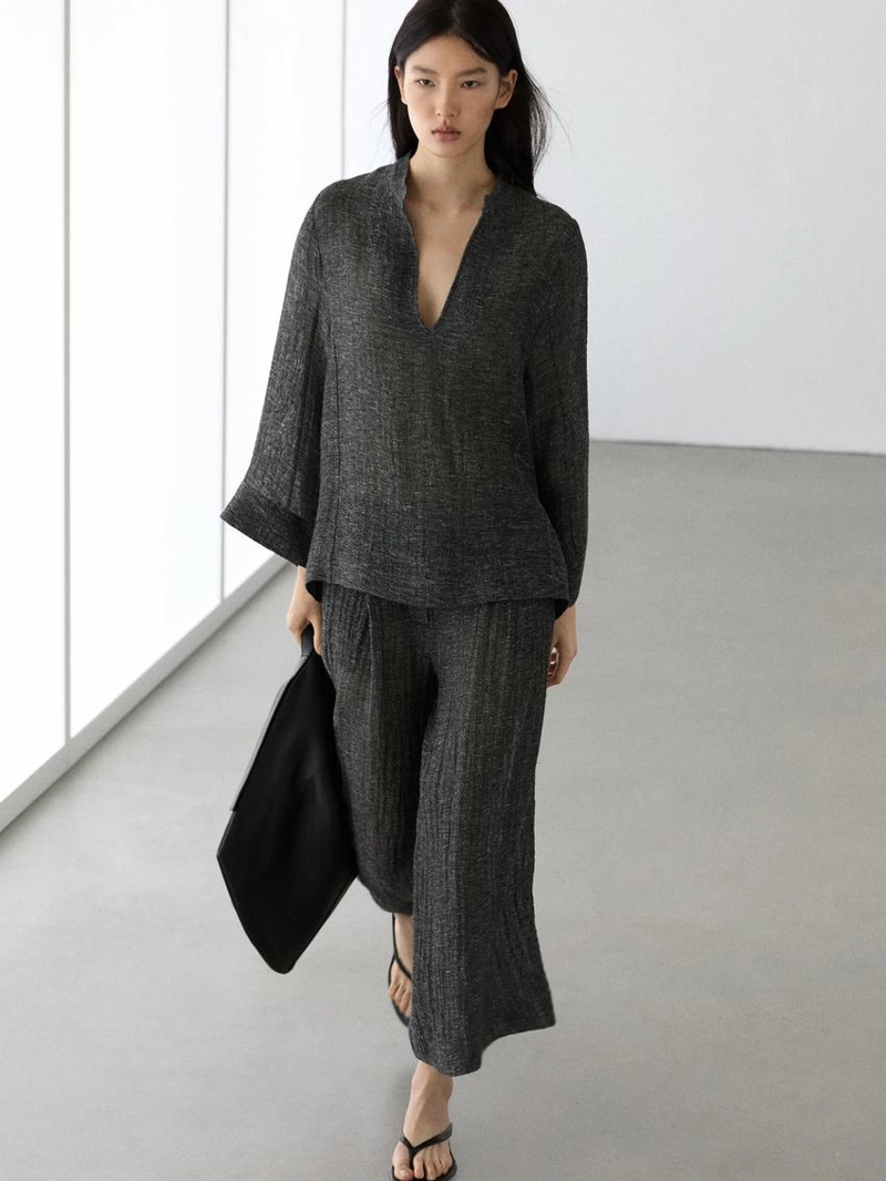 Брюки из меланжевого льна с защипами