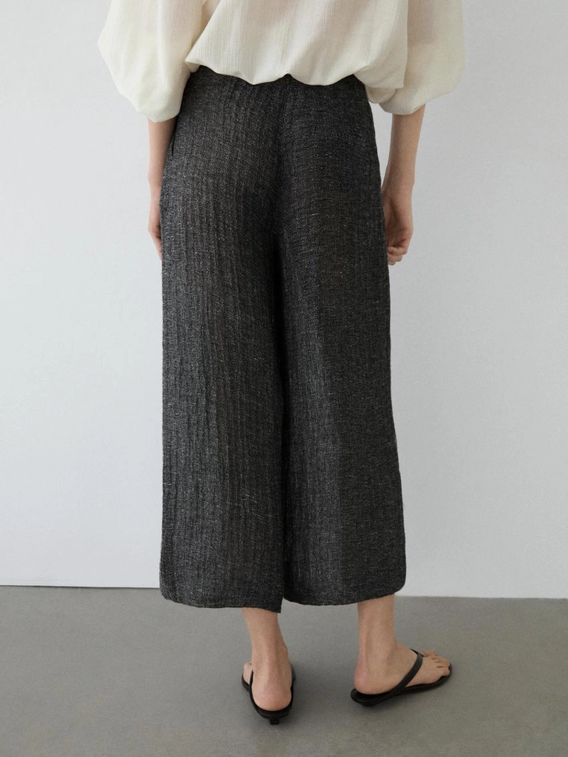 Брюки из меланжевого льна с защипами