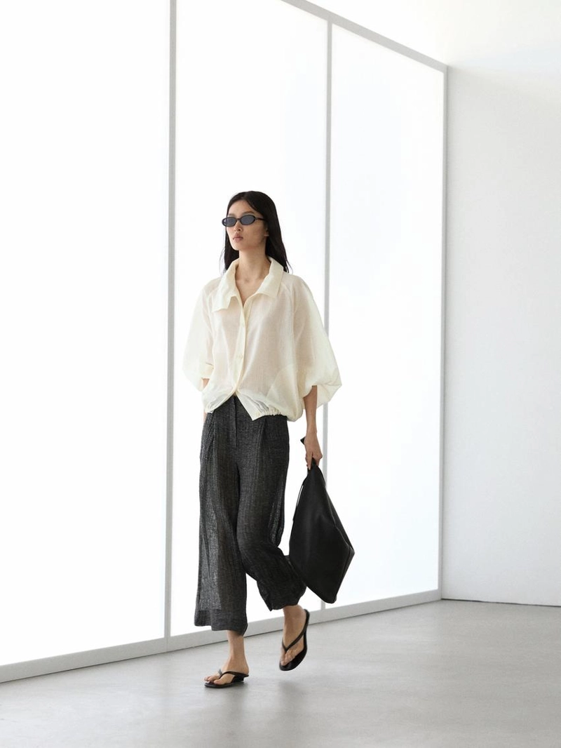 Брюки из меланжевого льна с защипами