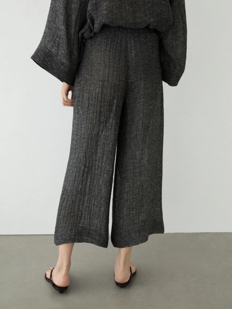 Брюки из меланжевого льна с защипами