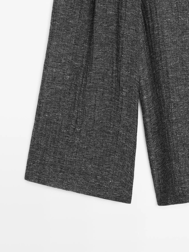 Брюки из меланжевого льна с защипами