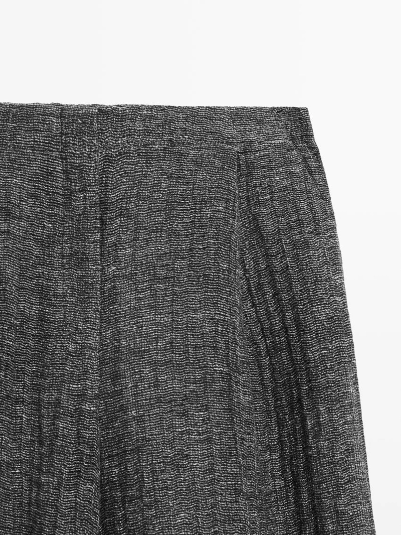 Брюки из меланжевого льна с защипами