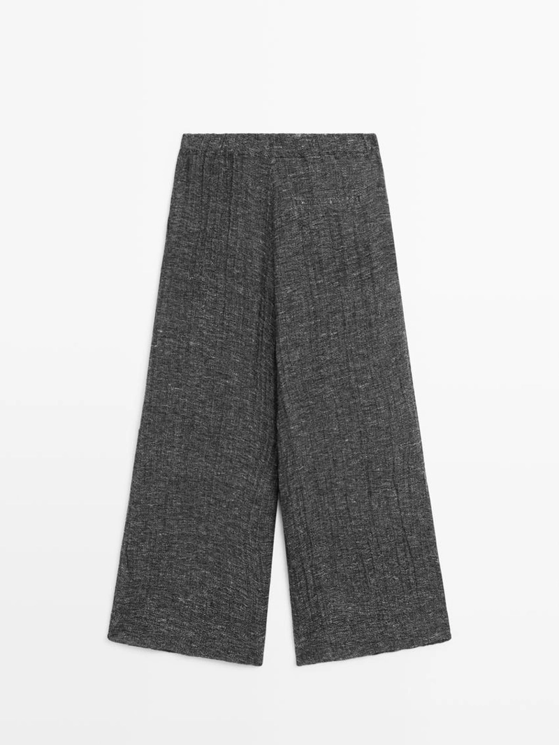 Брюки из меланжевого льна с защипами