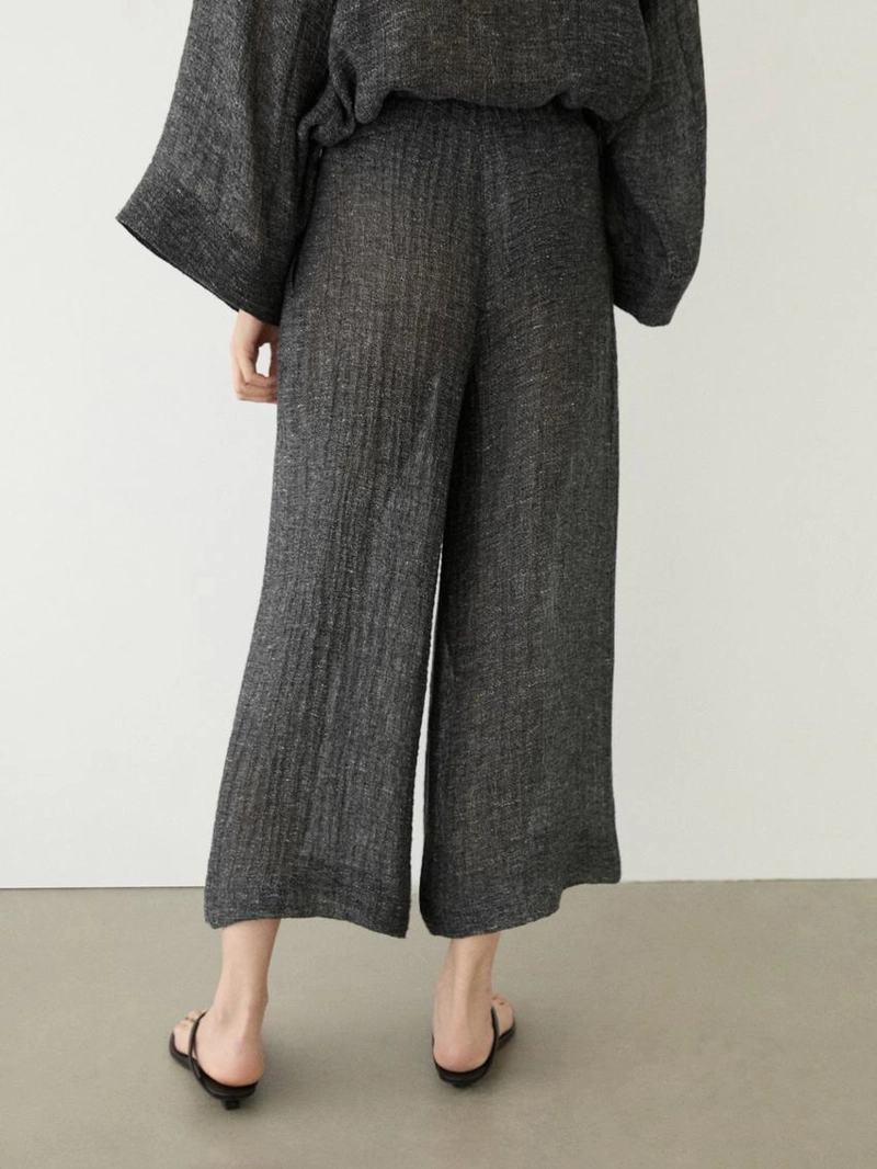 Брюки из меланжевого льна с защипами