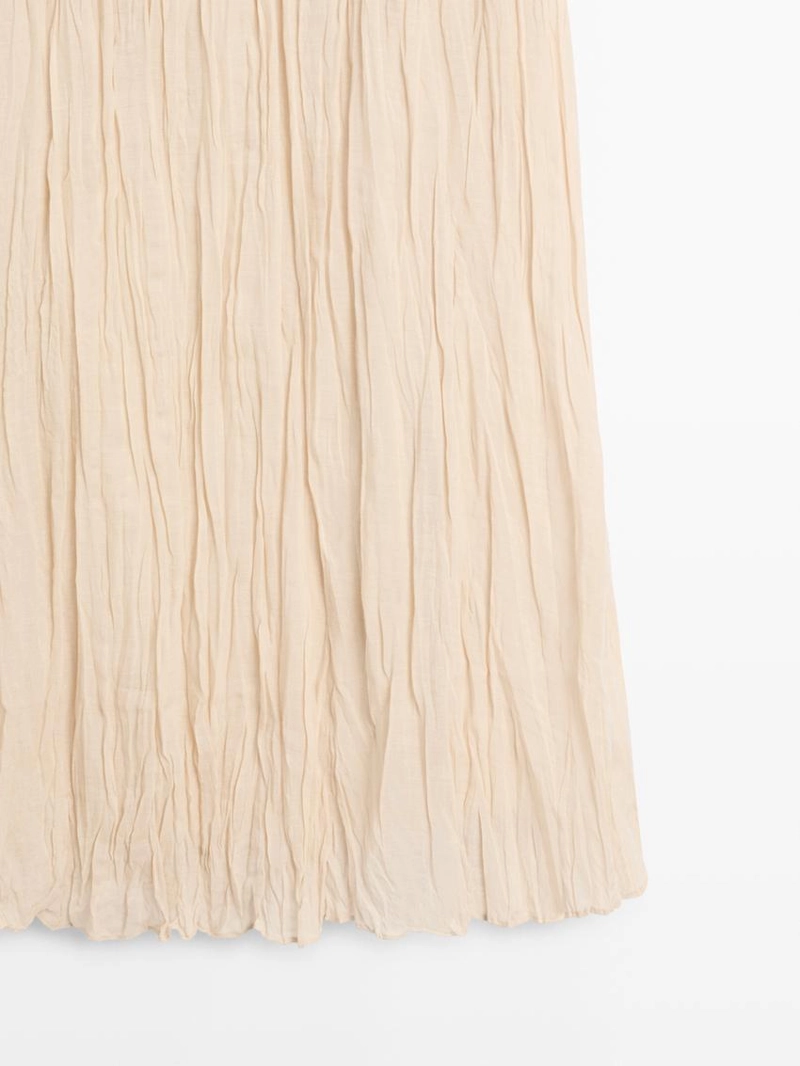 Пышная миди-юбка с деталями в складку