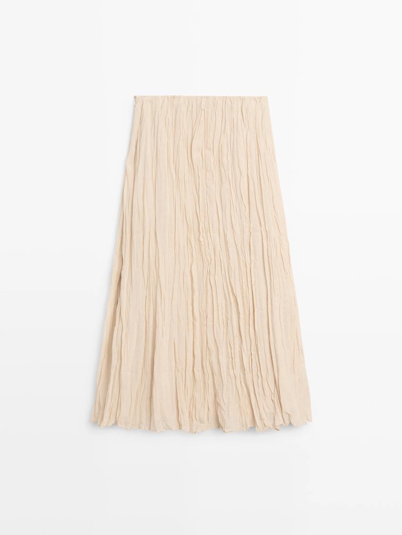 Пышная миди-юбка с деталями в складку