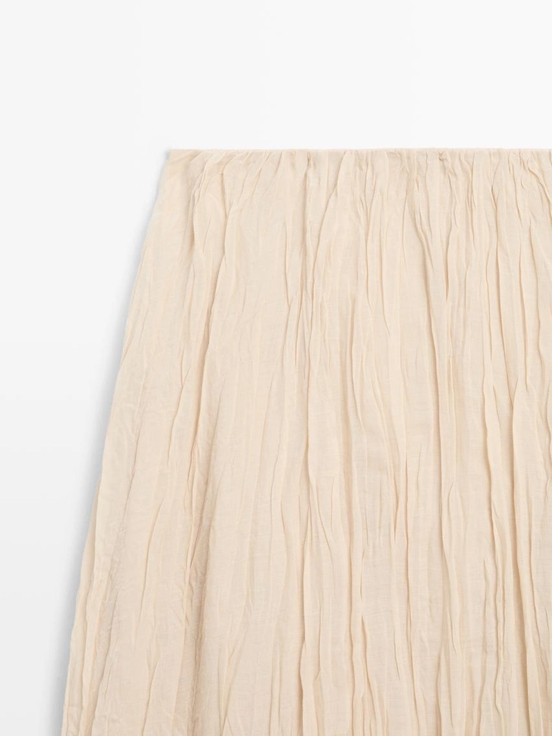 Пышная миди-юбка с деталями в складку