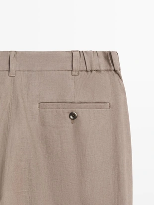 Льняные брюки прямого кроя- Заказать в России