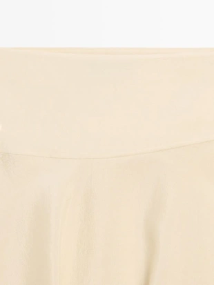 Юбка-миди с асимметричным подолом- Заказать в России