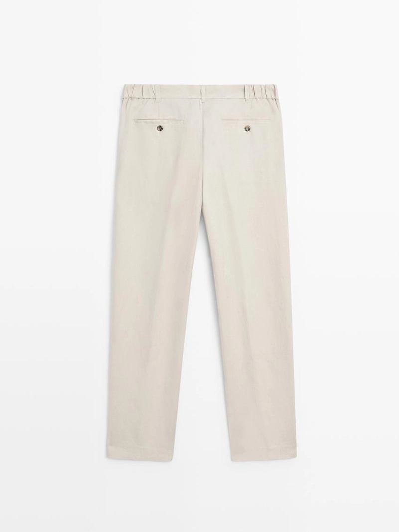 Брюки из льна с зауженным кроем