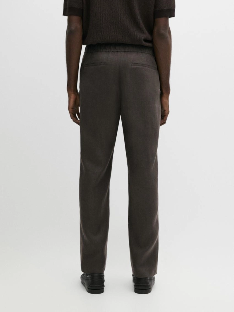 Льняные брюки в стиле джоггер