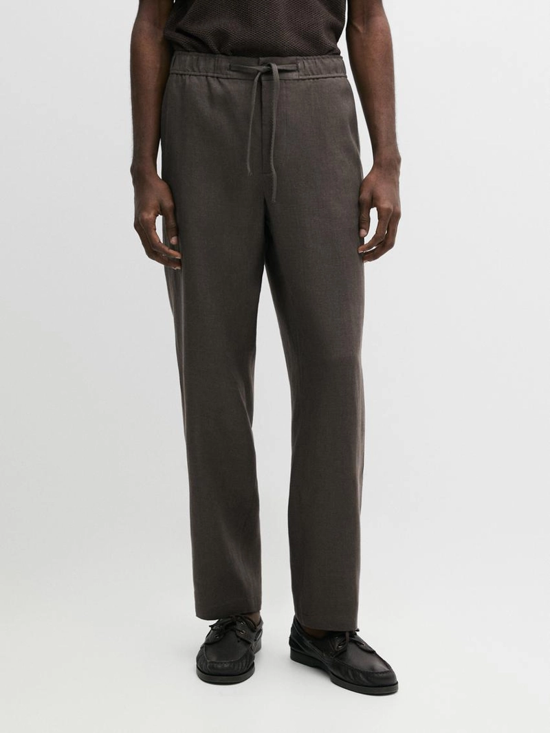 Льняные брюки в стиле джоггер