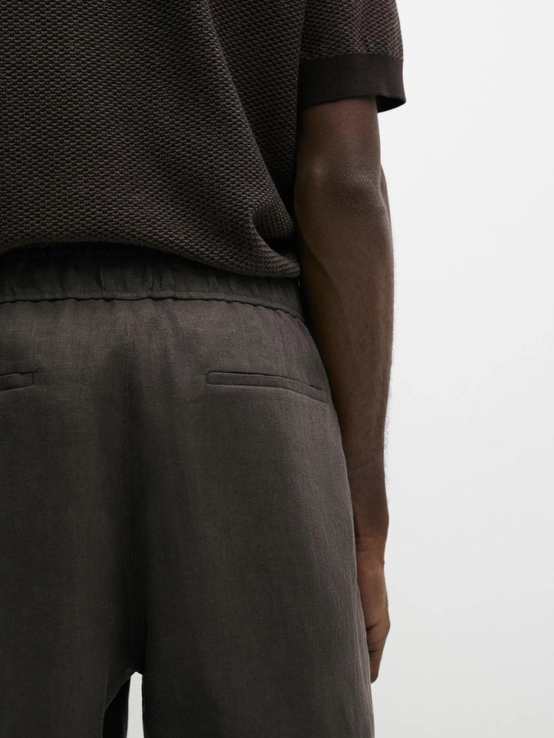 Льняные брюки в стиле джоггер