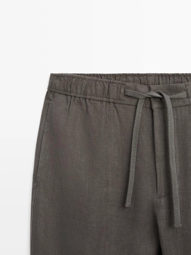 Льняные брюки в стиле джоггер